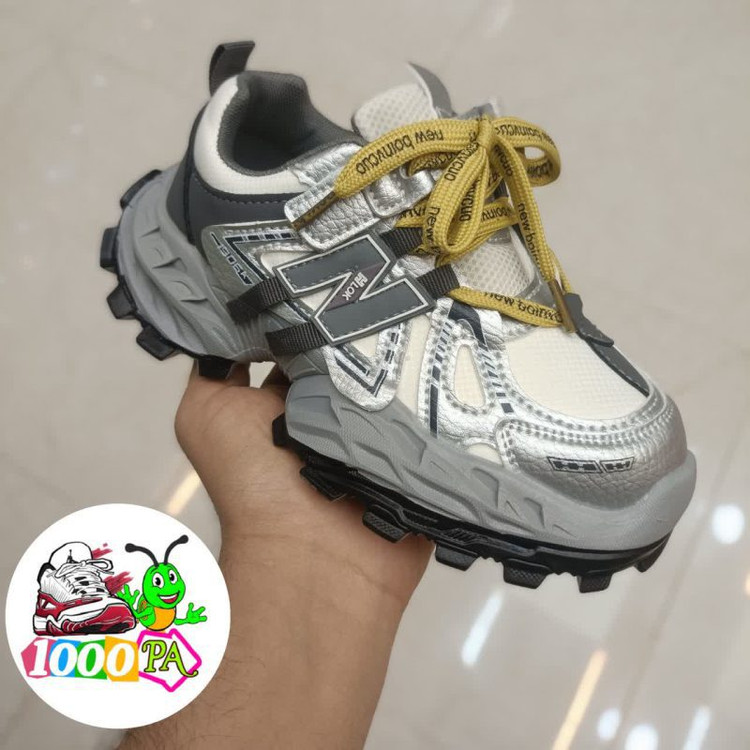 کتو نی وارداتی بچگانه طرح نیوبالانس (سایز 26 تا 37) - ضدآب، سبک و قابل شستشو- طوسی