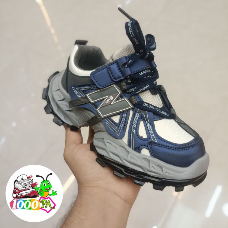 کتو نی وارداتی بچگانه طرح نیوبالانس (سایز 26 تا 37) - ضدآب، سبک و قابل شستشو -سرمه ای