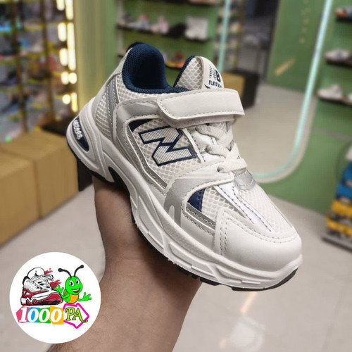 کتونی بچگانه نیو بالانس کد 3 - مدل 530 - رویه تنفسی و کفی طبی در سه رنگ جذاب سرمه ای سفید و مشکی - سرمه ای