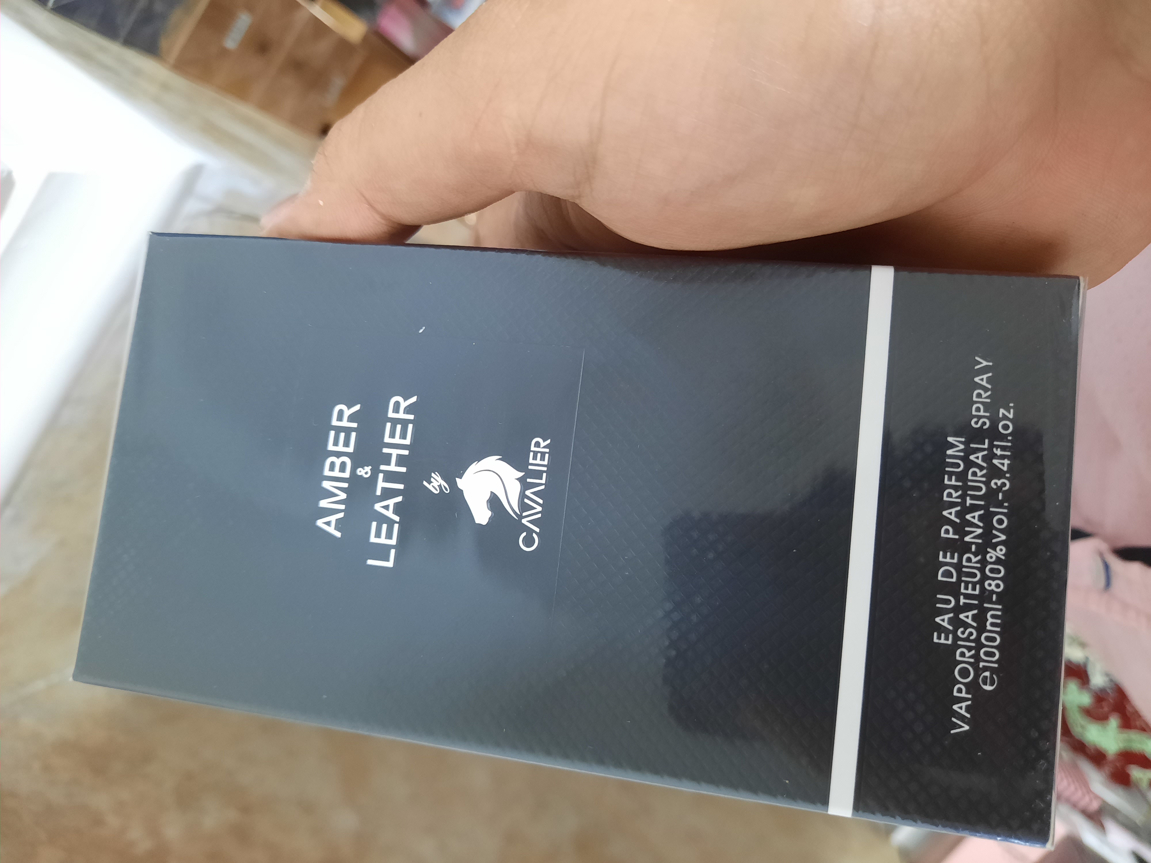 عطر مردانه آمبر لدر Cavalier Eau de Parfum 100ml رایحه گرم چرمی