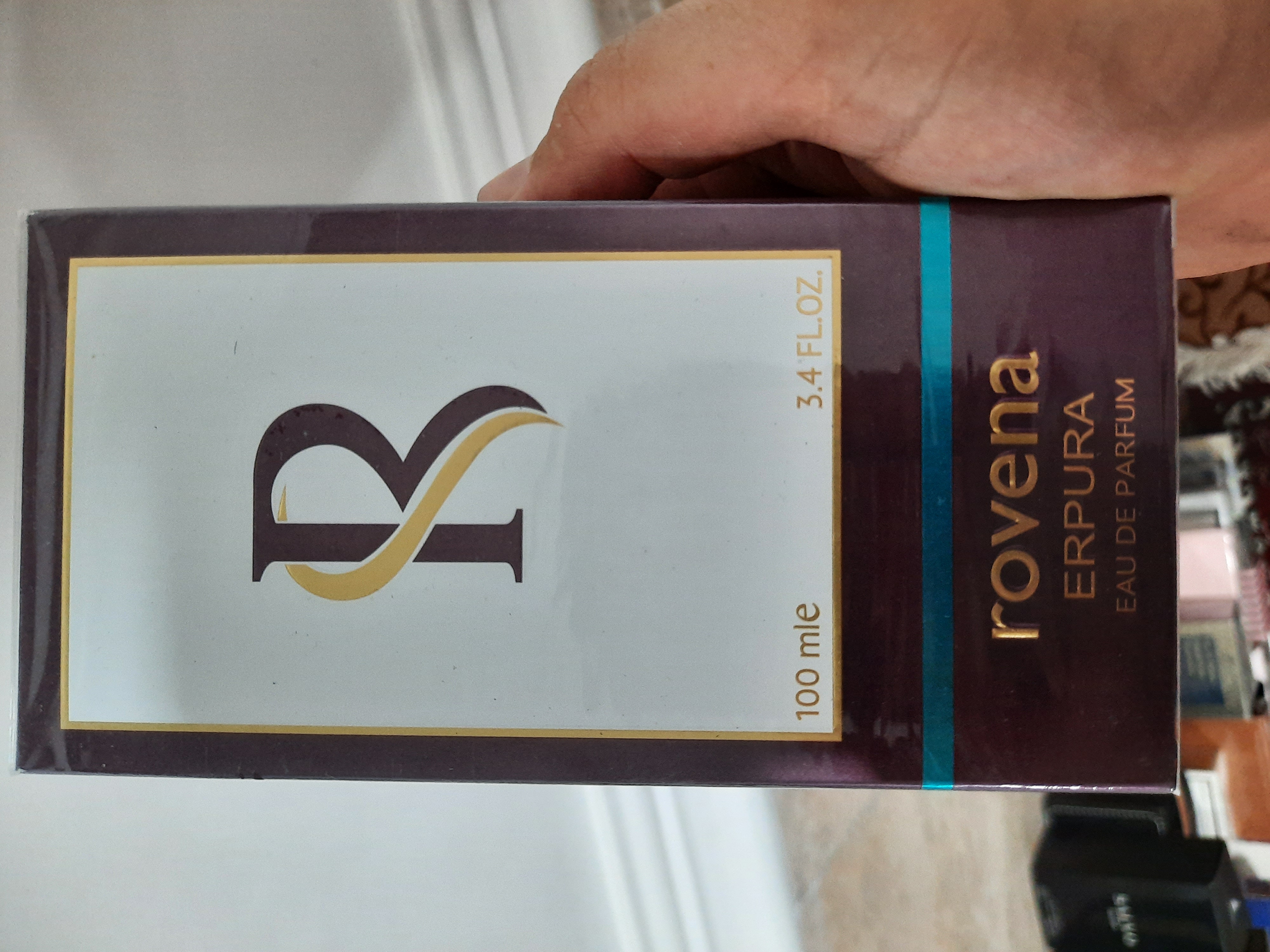 ادکلن روونا Erpura الهام گرفته از Xerjoff Erba Pura | عطری میوه‌ای شیرین و لوکس، گرم و اغواگر مناسب زنان و مردان خاص‌پسند